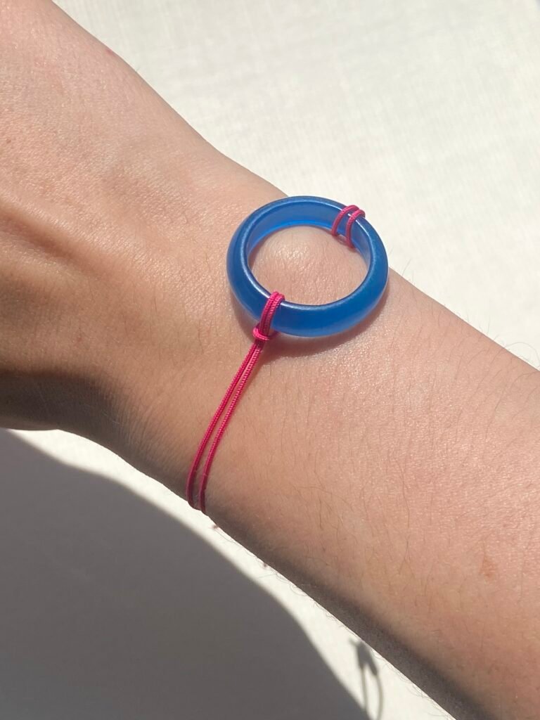 Circle Bracelet — Blue Glass Ring on Pink Cord