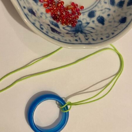 Circle Bracelet — Blue Ring on Green Cord